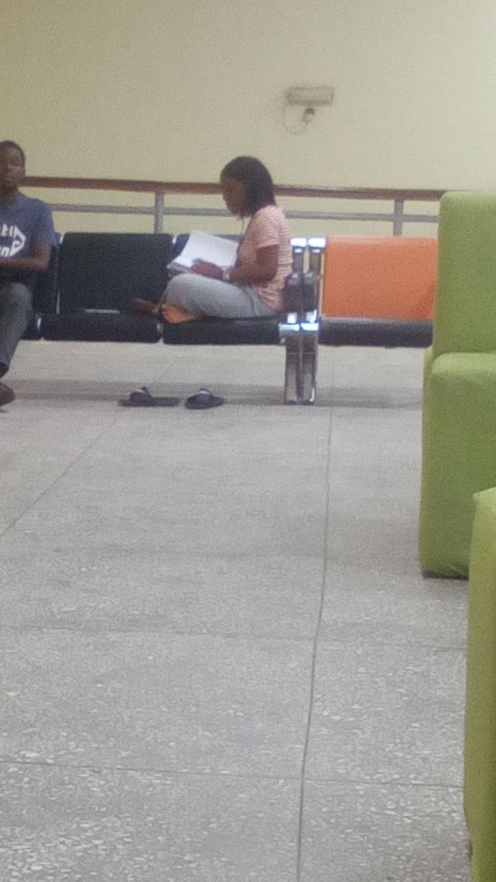 Elizabeth reading in the library